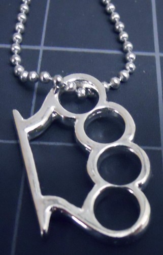 Brass knuckles necklace - knuckles,